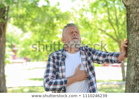 Foto stock: Senior Has Heart Ache