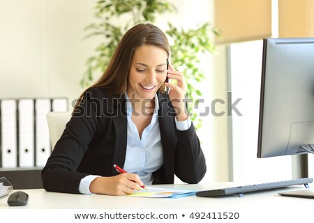 Foto stock: Business Professional Attending Call