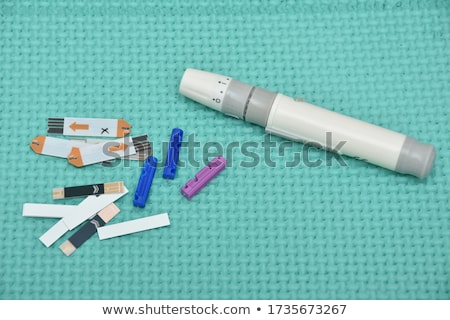 Foto stock: Diabetes Test With Strip Measure In Doctors Office