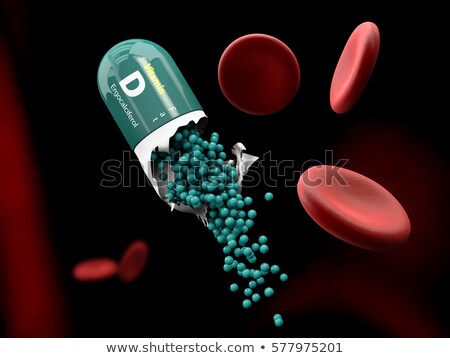 Stock photo: Illustration Of Vitamin D Capsule Dissolves In The Stomach