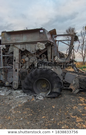 ストックフォト: Combine Harvester Destroyed By Fire