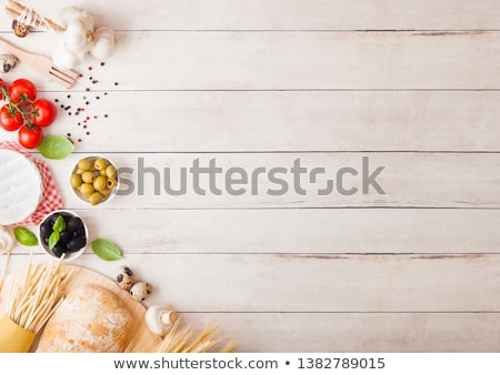 Stockfoto: Homemade Spaghetti Pasta With Quail Eggs With Bottle Of Tomato Sauce And Cheese On Wooden Background