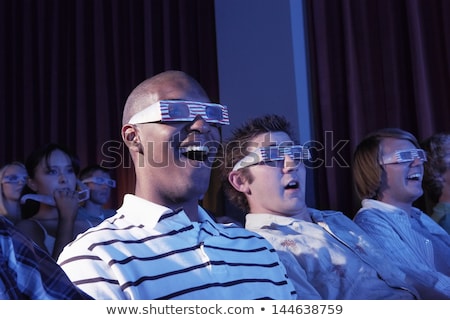 Stock photo: Excited Young Woman In Black 3d Glasses