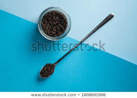 [[stock_photo]]: Sturgeon Black Caviar On Spoon