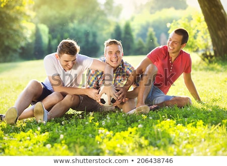 [[stock_photo]]: Happy Friends Spending Free Time Together In A Field