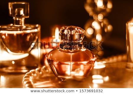 Foto stock: Perfume Bottle And Vintage Fragrance On Glamour Vanity Table At