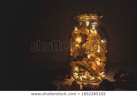 Stock fotó: Glass With Dried Leaves
