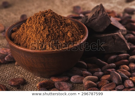 Foto stock: Macro Of Chocolate Candy And Cocoa Powder