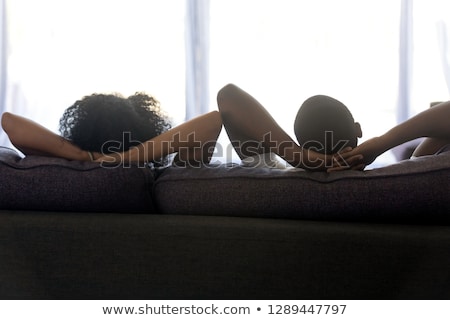 Foto stock: Couple Having A Lazy Day At Home