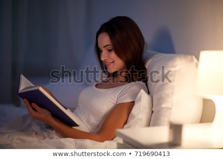 ストックフォト: Reading In Bed