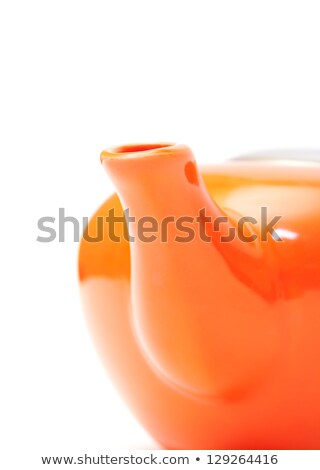 Part Of Orange Ceramic Teapot Closeup ストックフォト © Discovod