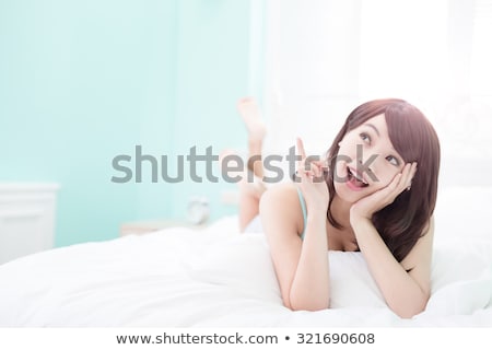 Foto d'archivio: Young Woman Lying Awake In Bed Thinking