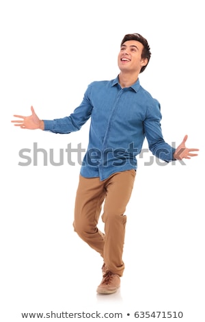 [[stock_photo]]: Excited Young Casual Man Is Looking Surprised