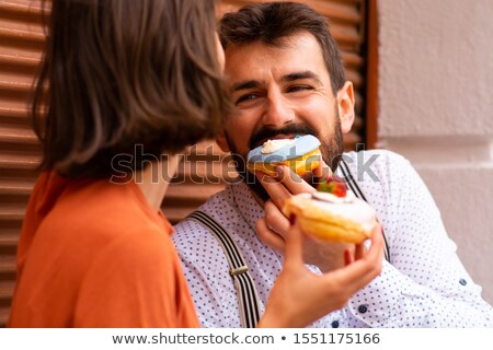Stock fotó: Playful Man Looking With Anticipation At Cake