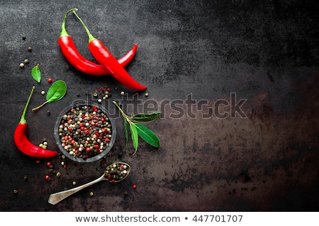 Foto stock: Red Hot Chili Pepper Corns And Pods On Dark Old Metal Culinary Background