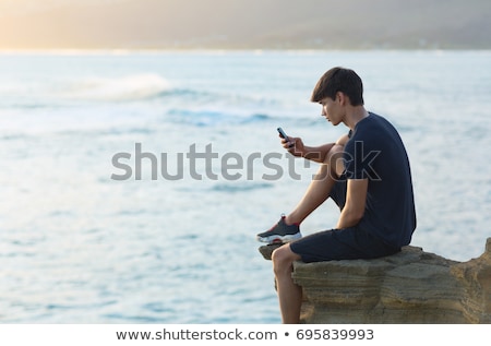 Сток-фото: Boys On Beach Rocks