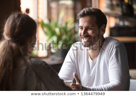Stock photo: Handsome Man Looking At Two Women