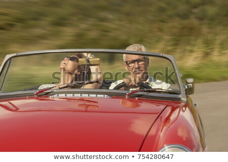 Сток-фото: Mid Aged Couple In Sports Car