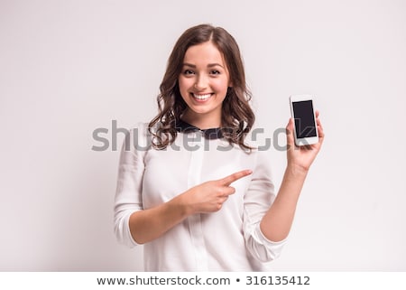 ストックフォト: 顔と携帯電話で話している10代の少女の肖像画