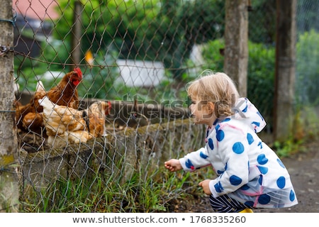 Foto stock: Girl Playing With Gum