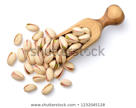 Foto stock: Scoop Of Roasted And Salted Pistachios