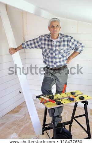 Foto stock: Man Putting Up Tongue And Groove