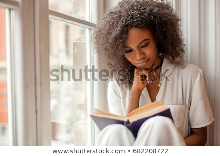 Сток-фото: Young Woman Reading Book