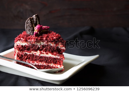 [[stock_photo]]: Decorated Wedding Cake With Red Roses