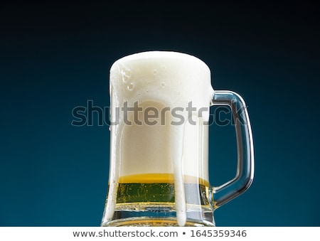Stock photo: Fresh And Cold Foamy Beer
