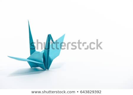 ストックフォト: Origami Crane Isolated On Light Blue Background