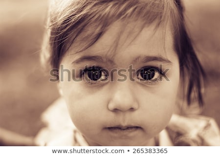 ストックフォト: Portrait Of Poverty Little Boy With Sad Eyes