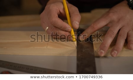 Сток-фото: Carpenter Handyman Sharpening Pencil With Pocket Knife