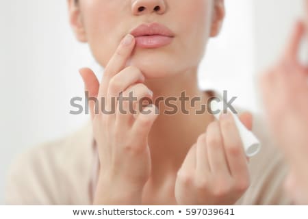 Stok fotoğraf: Beautiful Woman Lips Closeup With Mirror Reflections