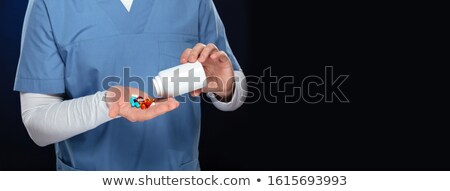 Foto stock: Cropped Image Of A Smling Male Doctor
