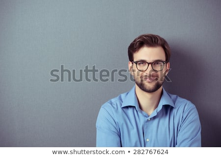 Сток-фото: Portrait Of Attractive Young Businessman With Folded Arms