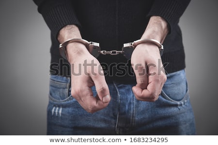 Foto stock: Arrested Man In Handcuffs