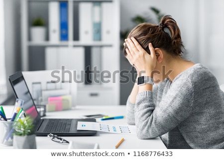 Foto stock: Stressed Web Designer With User Interface Layout