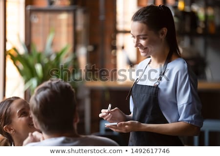 Stock photo: Waitress Taking An Order In A Restaurant