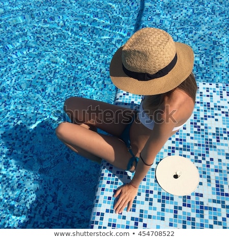 Stock foto: Sexy Woman Swimming In A Pool