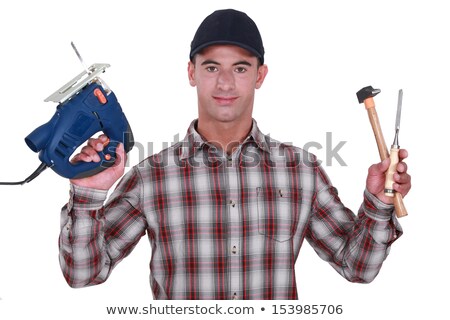 Zdjęcia stock: Man Holding Band Saw Hammer And Chisel