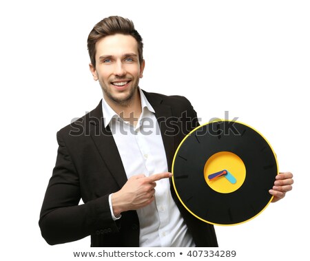 Foto stock: Man Holding Big Black Clock