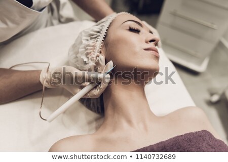 Foto stock: Woman Doing Cosmetic Procedures