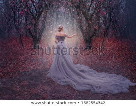 Stockfoto: Fashion Elegant Blond Woman Model In Red Gown With Long Train Of