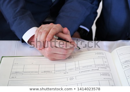 Stock fotó: Close Up Of Male Gay Hands With Wedding Rings On