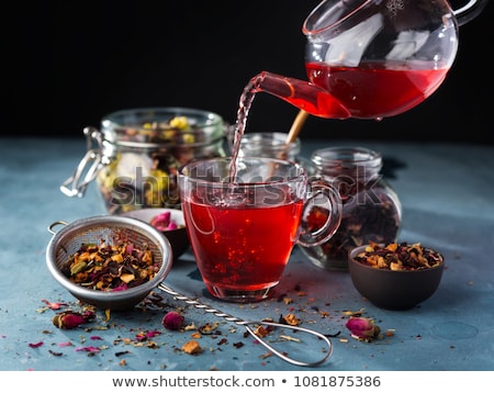 Foto stock: Fruit Tea Dried Fruits And Spices In Transparent Cup