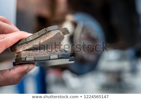 Stock fotó: Set Of Old Worn Brake Pads For A Car