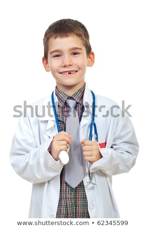 Stock photo: Caucasian Boy In Doctor Coat Holding A Stethoscope