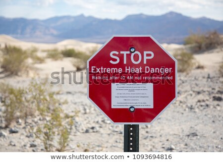 [[stock_photo]]: Warning Sign At Death Valley