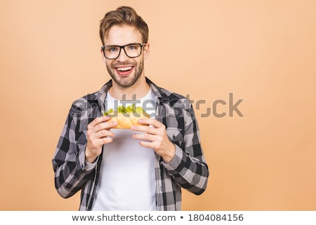 Stock fotó: Insatiable And Hungry Man Eating A Sandwich