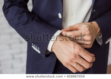 Foto d'archivio: Elegant Young Fashion Man Dressing Up For Wedding Celebration